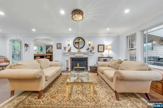 a bedroom with a bed and a lamp on table