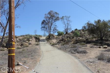 42600 San Ignacio Road Hemet, CA 92544 - Photo 14 of 22 a view of a road with a building in the background