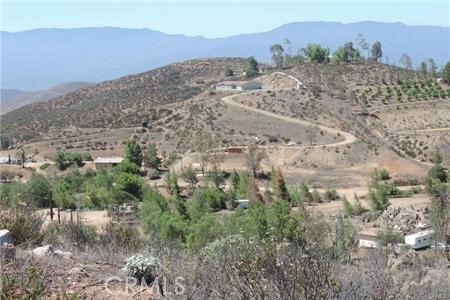 42600 San Ignacio Road Hemet, CA 92544 - Photo 21 of 22 a view of a dry yard with mountains in the background