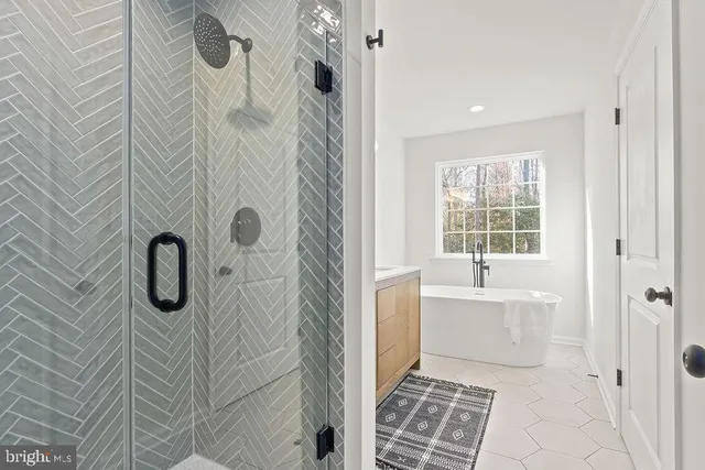 a bathroom with a sink and a window