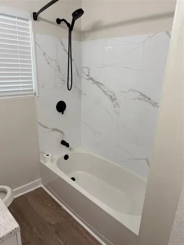 a bathroom with a bathtub