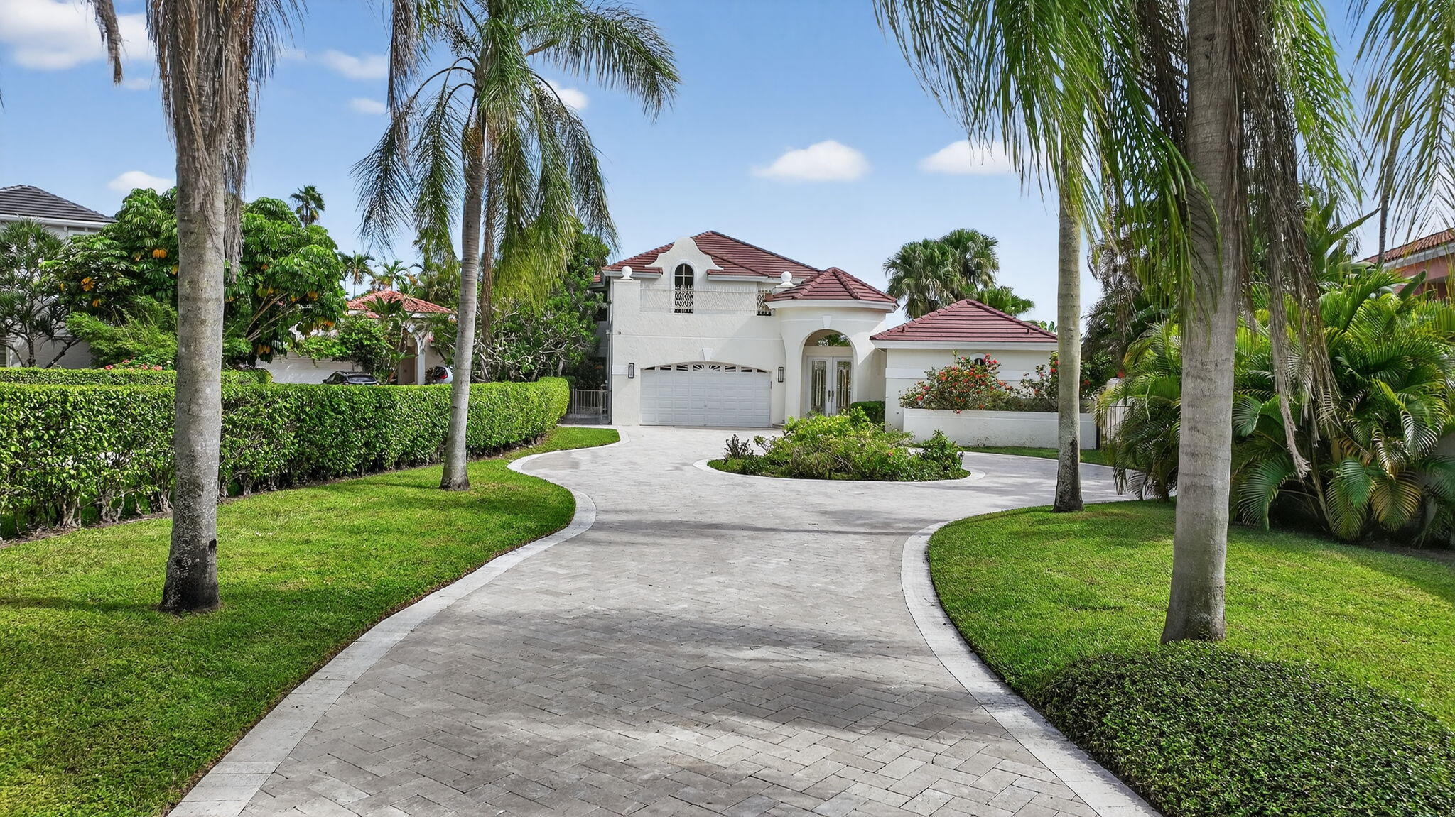 16670 Senterra Drive Delray Beach, FL 33484 - Photo 3 of 80 PRIVATE LONG TRAVERTINE MARBLE DRIVE