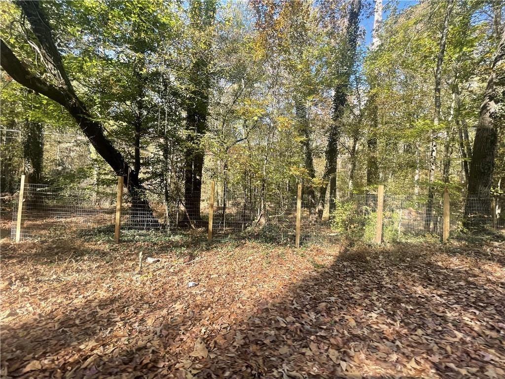 2633 Brannan Road Southwest Snellville, GA 30039 - Photo 5 of 20 a view of a yard with trees