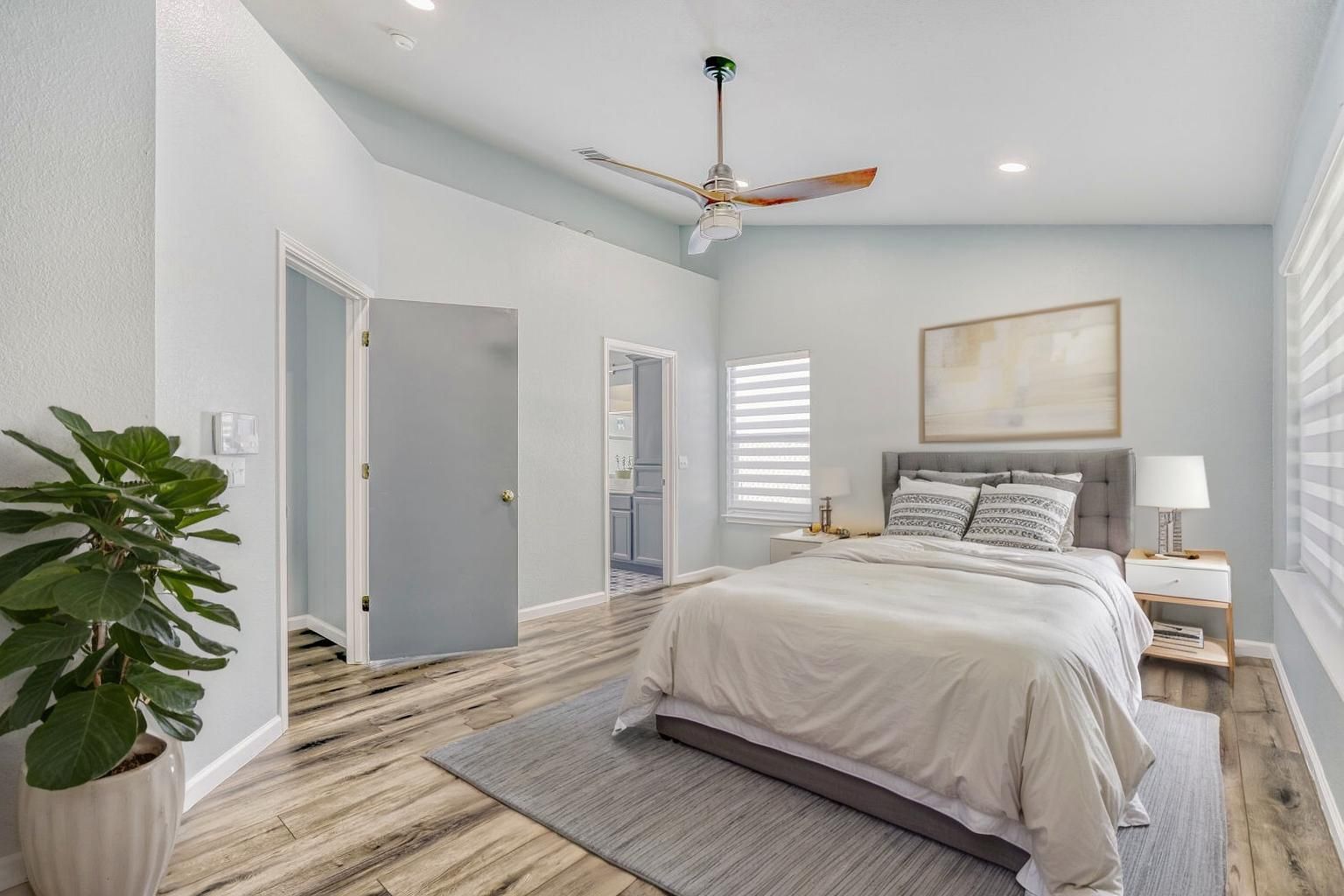 2529 Tandi Trail Round Rock, TX 78664 - Photo 14 of 32 a bedroom with a large bed and a potted plant