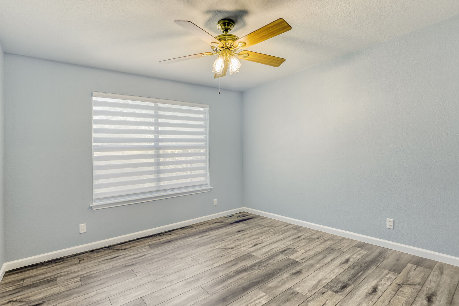 2529 Tandi Trail Round Rock, TX 78664 - Photo 21 of 32 wooden floor in an empty room with a window