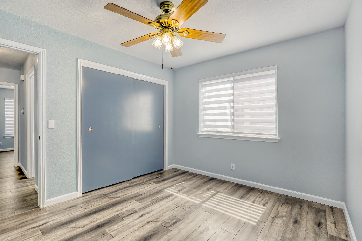 2529 Tandi Trail Round Rock, TX 78664 - Photo 25 of 32 a view of an empty room with window and wooden floor