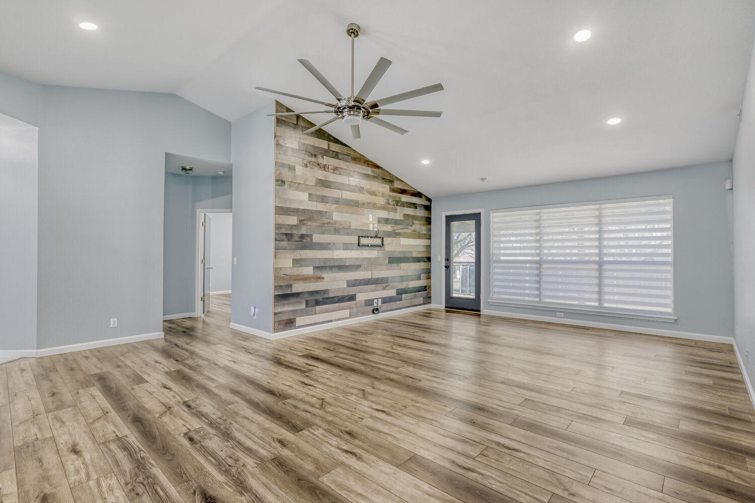 2529 Tandi Trail Round Rock, TX 78664 - Photo 6 of 32 an empty room with wooden floor closet and windows