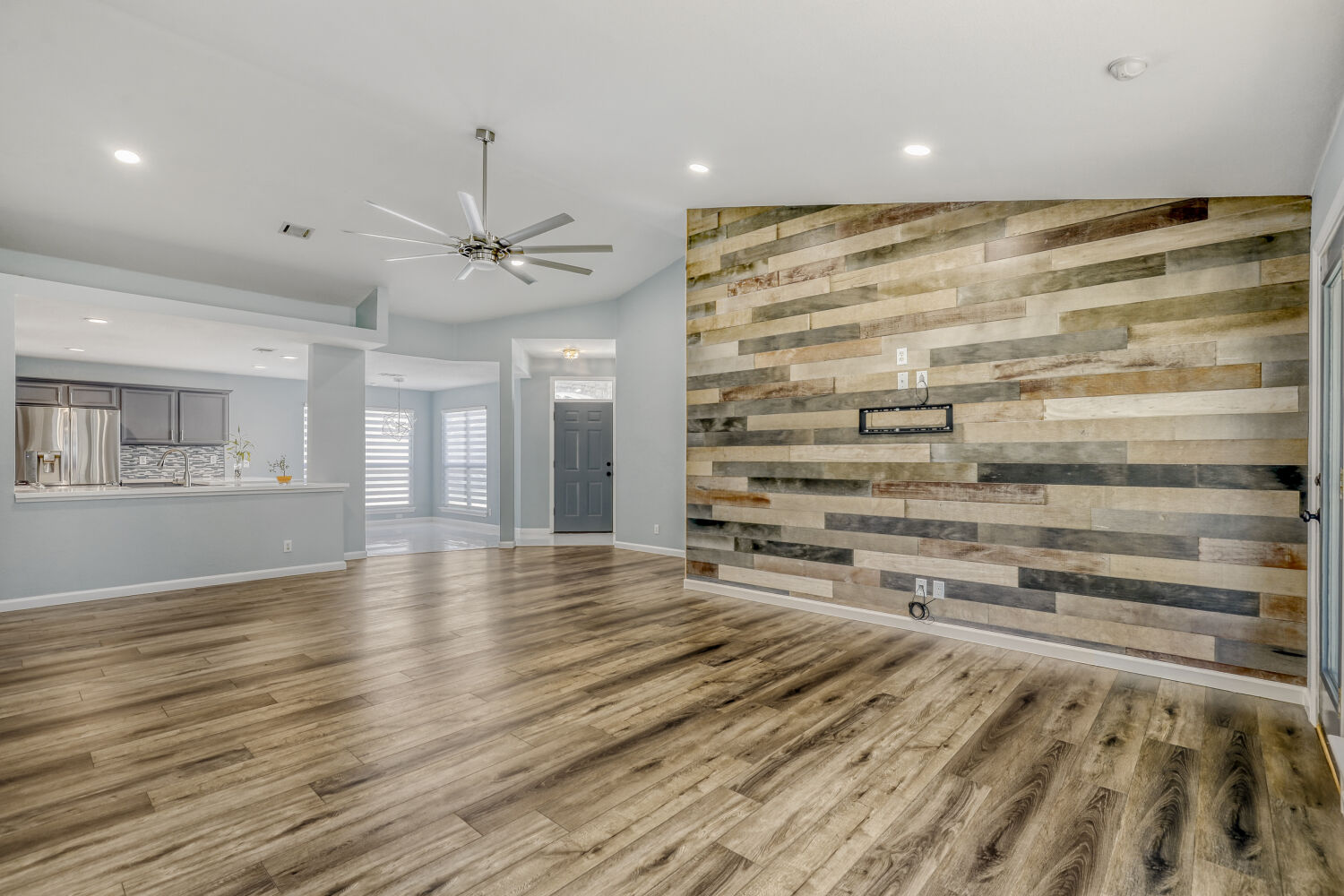 2529 Tandi Trail Round Rock, TX 78664 - Photo 7 of 32 wooden floor in an empty room with a window