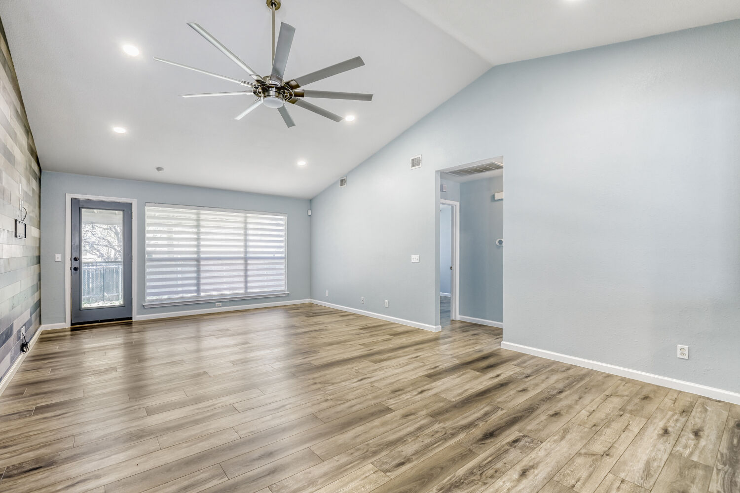 2529 Tandi Trail Round Rock, TX 78664 - Photo 8 of 32 a view of an empty room with window and wooden floor