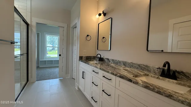 $584,900 | 295 East Ivybridge Drive, Hubert, NC 28539