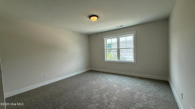 $584,900 | 295 East Ivybridge Drive, Hubert, NC 28539