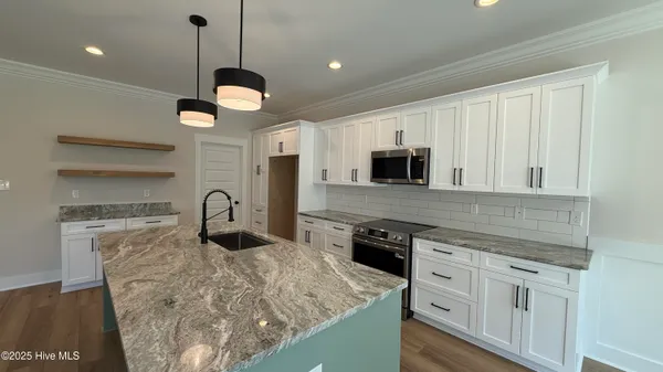 $584,900 | 295 East Ivybridge Drive, Hubert, NC 28539