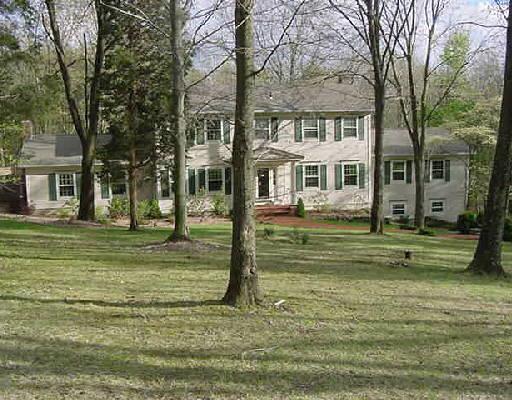 5 Bonny Road Brookfield, CT 06804 - Photo 1 of 1 a view of a house in a big yard with large trees