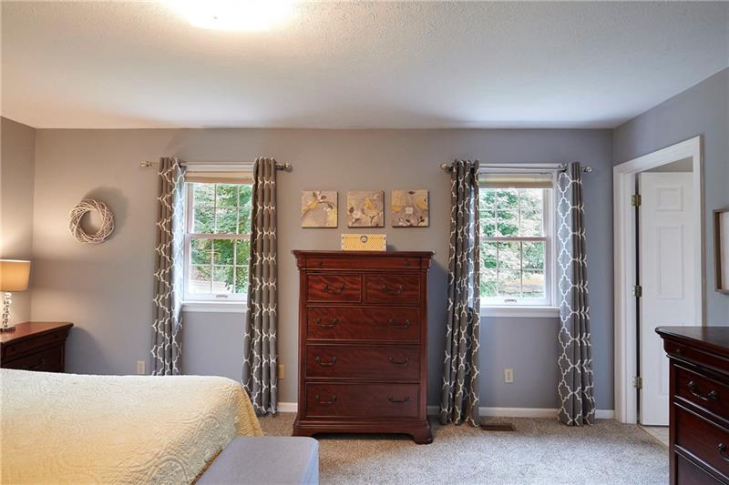 7965 Franklin Road Evans City, PA 16033 - Photo 14 of 25 Bright windows flood the master bedroom with natural sunlight.