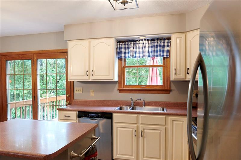 7965 Franklin Road Evans City, PA 16033 - Photo 8 of 25 Plenty of space for meal prep and clean up while taking in the serene wooded views.
