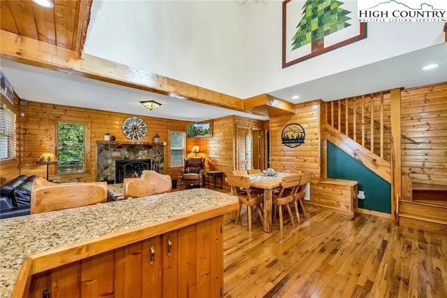 a view of a patio with a table and chairs