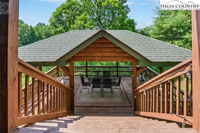 an aerial view of residential house with green space