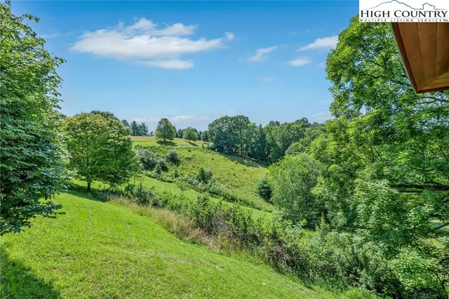 a view of a chairs on the deck