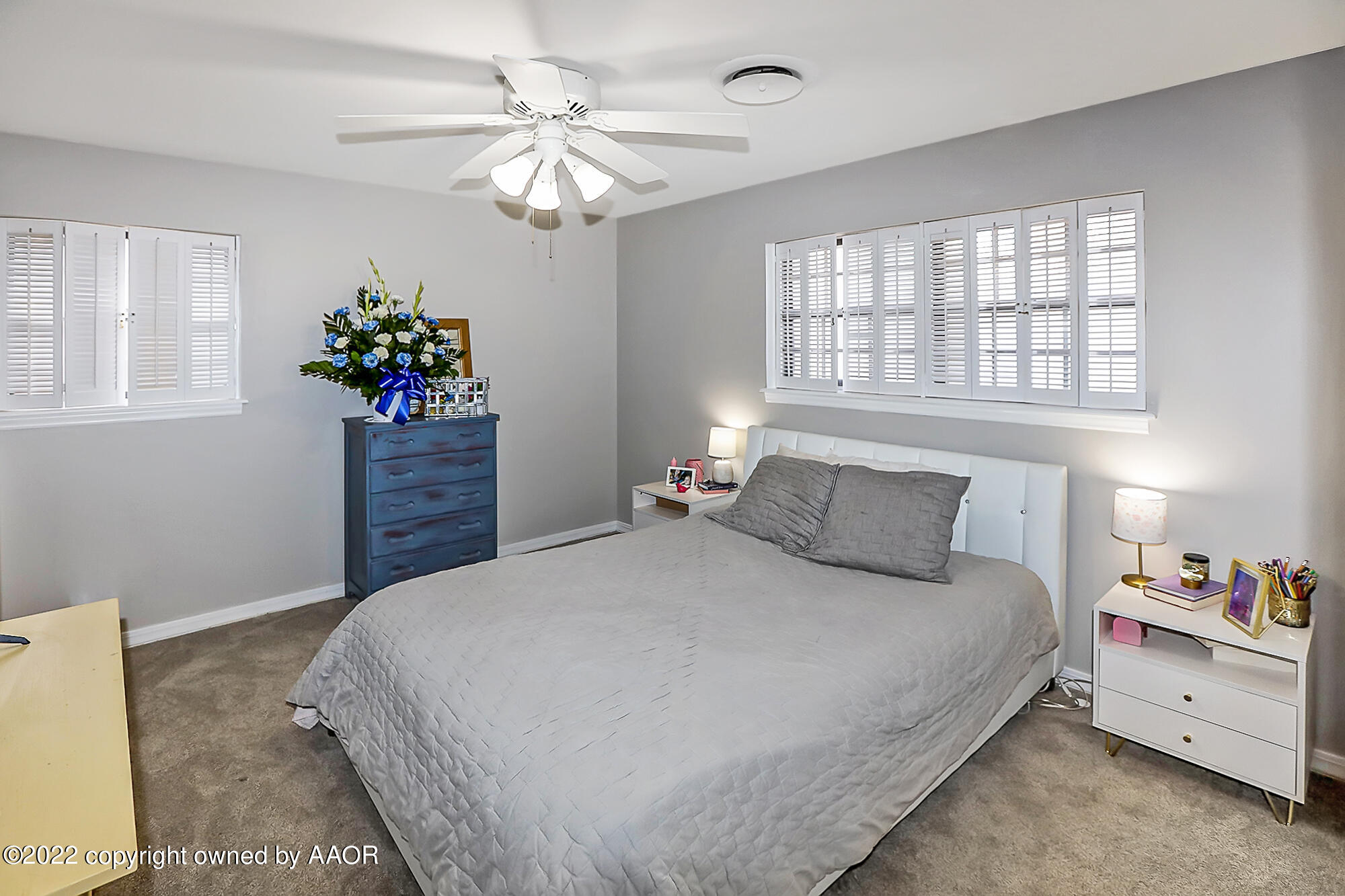 6303 Calumet Road Amarillo, TX 79106 - Photo 20 of 31 a bedroom with a bed and a dresser