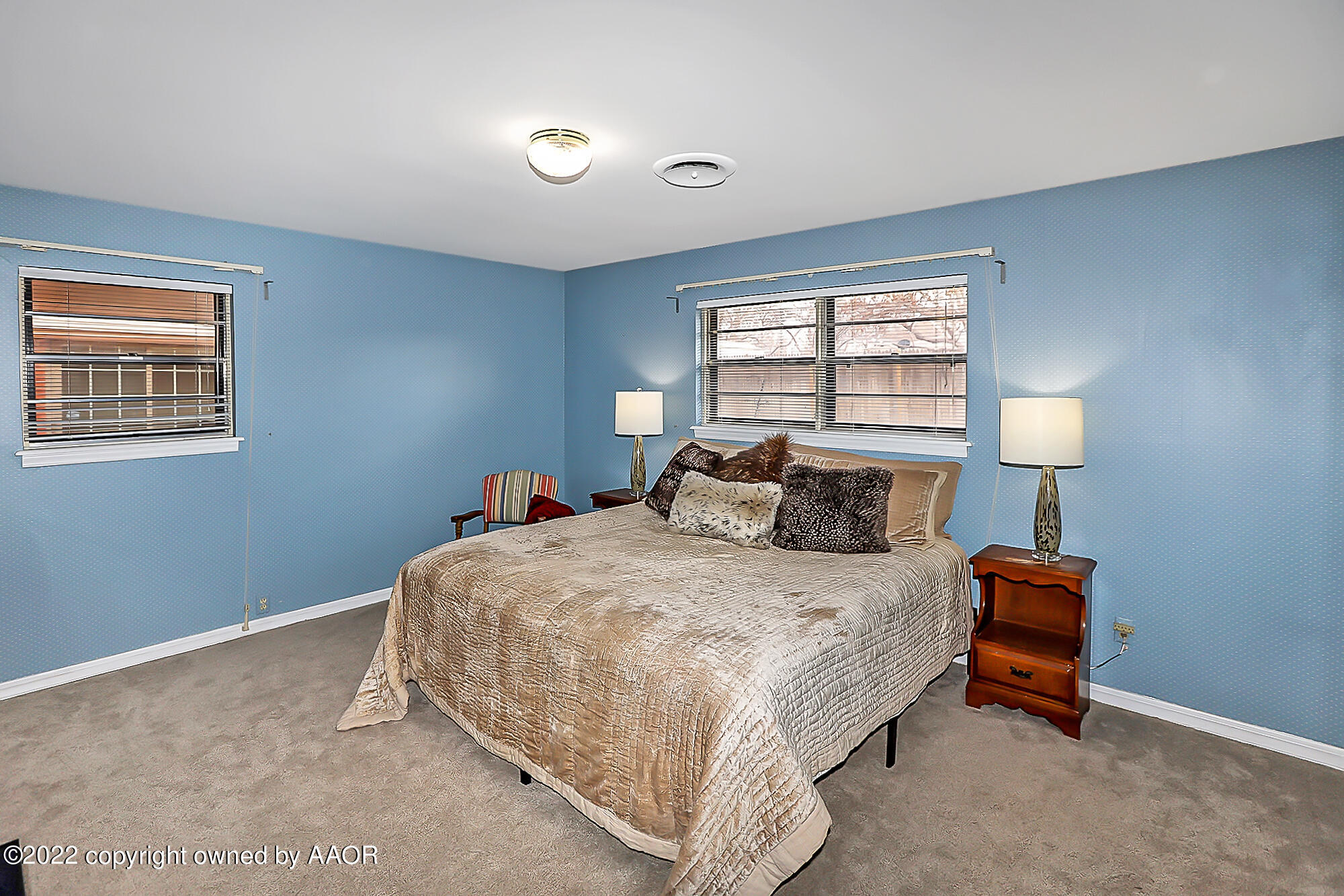 6303 Calumet Road Amarillo, TX 79106 - Photo 25 of 31 a bedroom with a bed and window