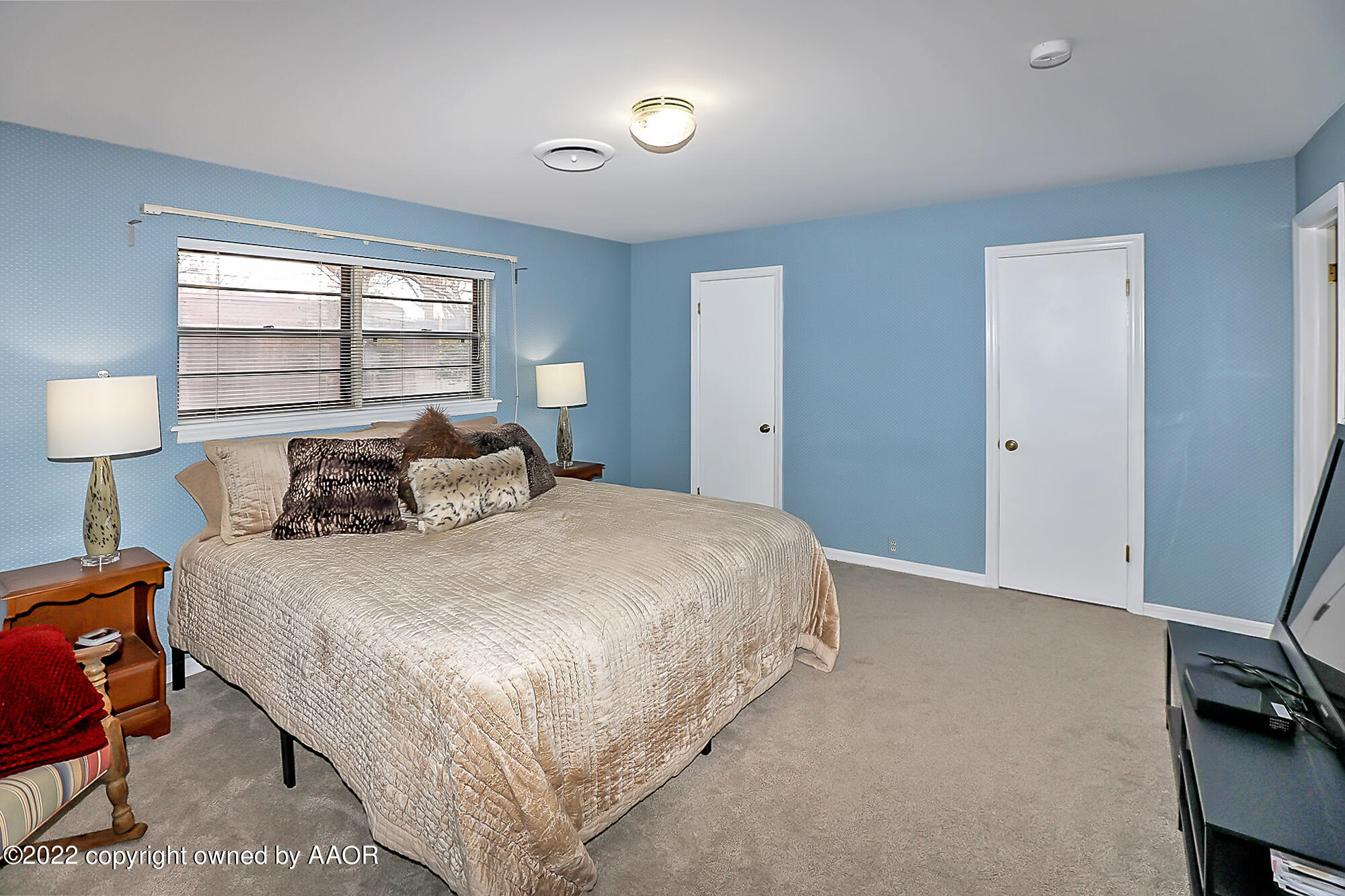 6303 Calumet Road Amarillo, TX 79106 - Photo 26 of 31 a bedroom with a bed and a window