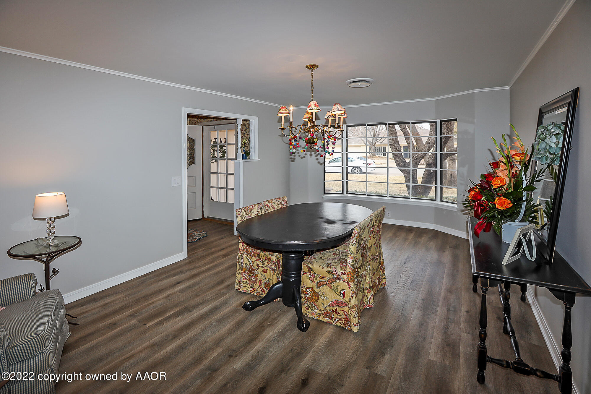 6303 Calumet Road Amarillo, TX 79106 - Photo 3 of 31 a view of a livingroom with furniture a chandelier