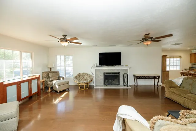 a living room with furniture or fireplace and a flat screen tv
