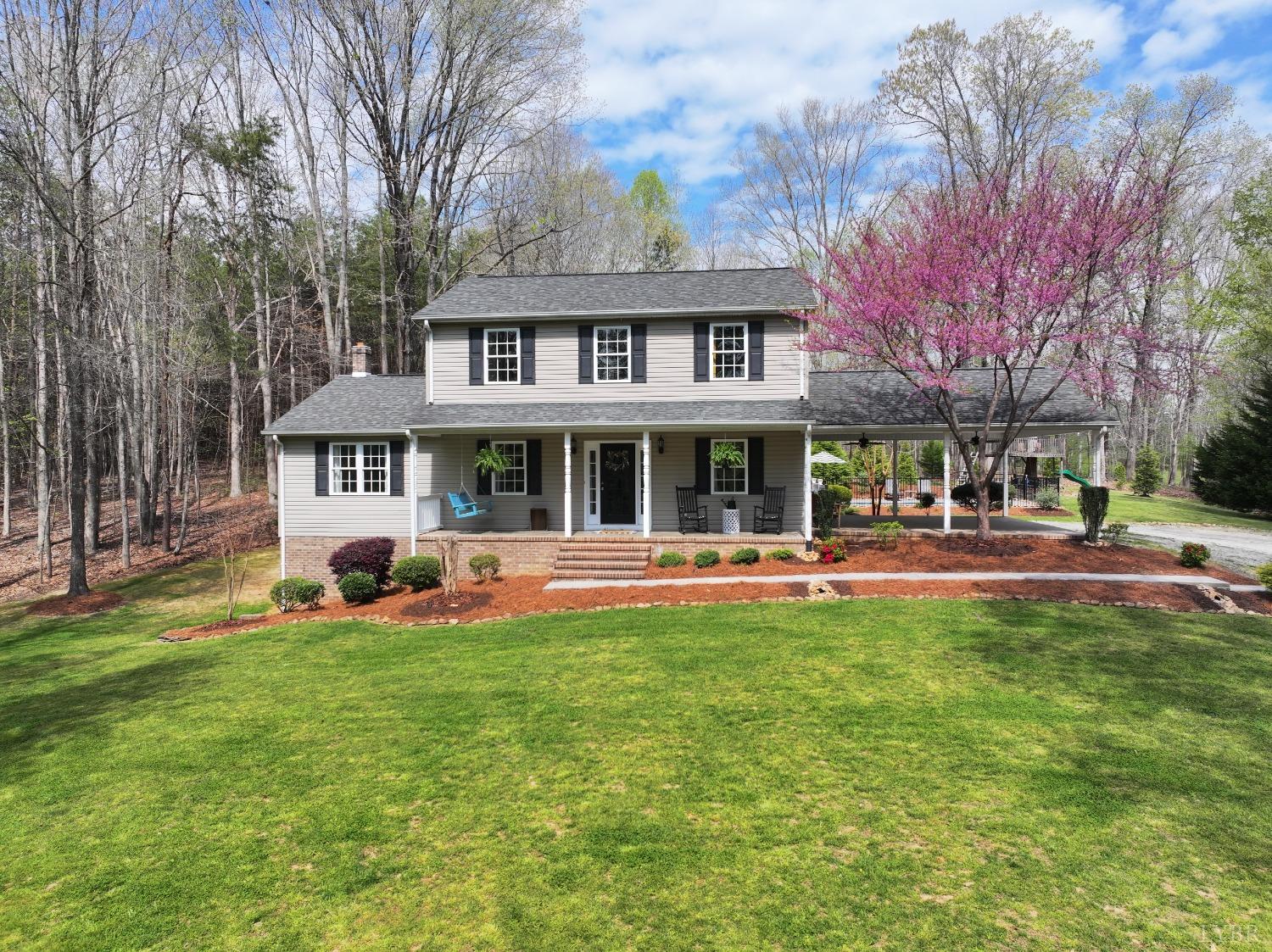 120 Ripley Drive Danville, VA 24540 - Photo 1 of 71 a front view of a building with a garden