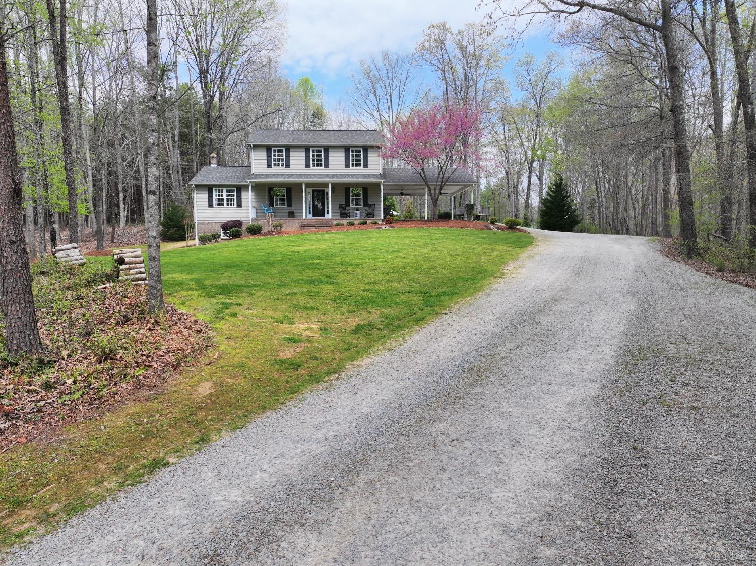 120 Ripley Drive Danville, VA 24540 - Photo 17 of 71 a view of a house with a yard and large trees