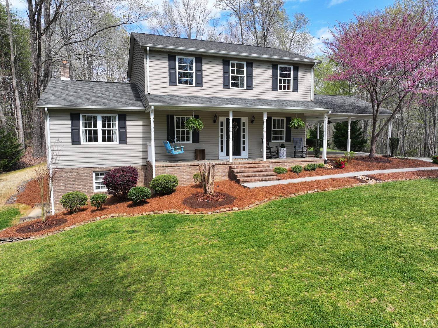 120 Ripley Drive Danville, VA 24540 - Photo 2 of 71 front view of a house with a yard