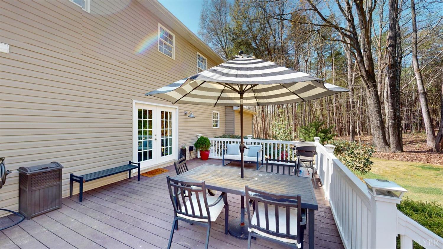 120 Ripley Drive Danville, VA 24540 - Photo 21 of 71 a view of a patio with a table and chairs