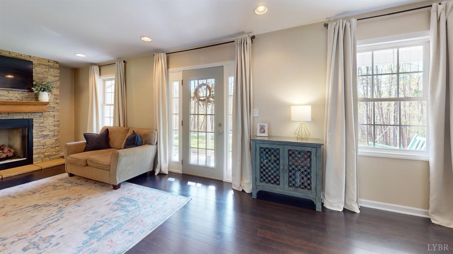120 Ripley Drive Danville, VA 24540 - Photo 25 of 71 a living room with furniture and a fireplace