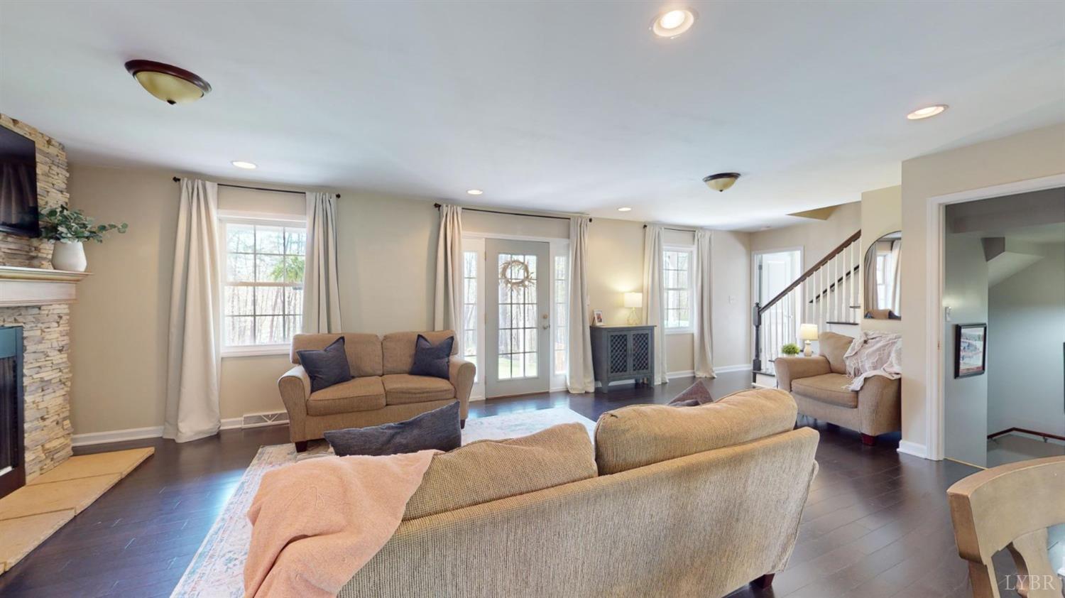 120 Ripley Drive Danville, VA 24540 - Photo 27 of 71 a living room with fireplace furniture and a flat screen tv