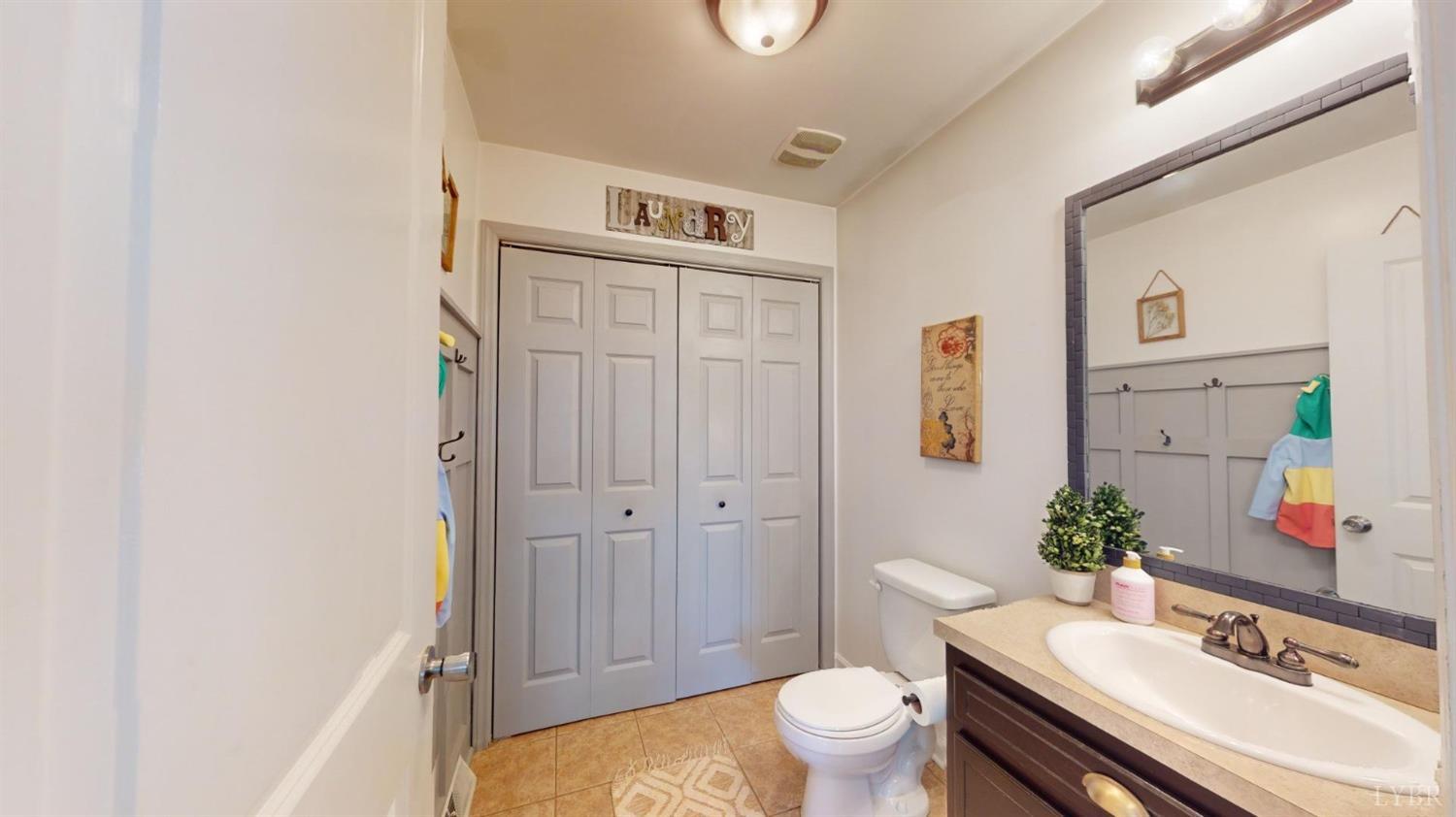 120 Ripley Drive Danville, VA 24540 - Photo 35 of 71 a bathroom with a sink a toilet and shower