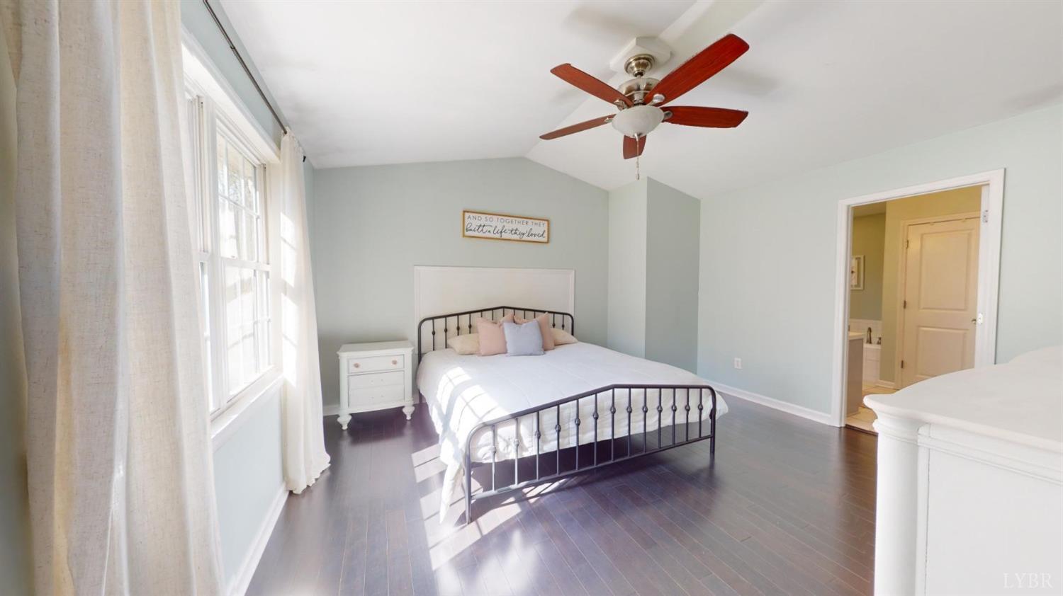 120 Ripley Drive Danville, VA 24540 - Photo 38 of 71 a bedroom with a bed and a ceiling fan