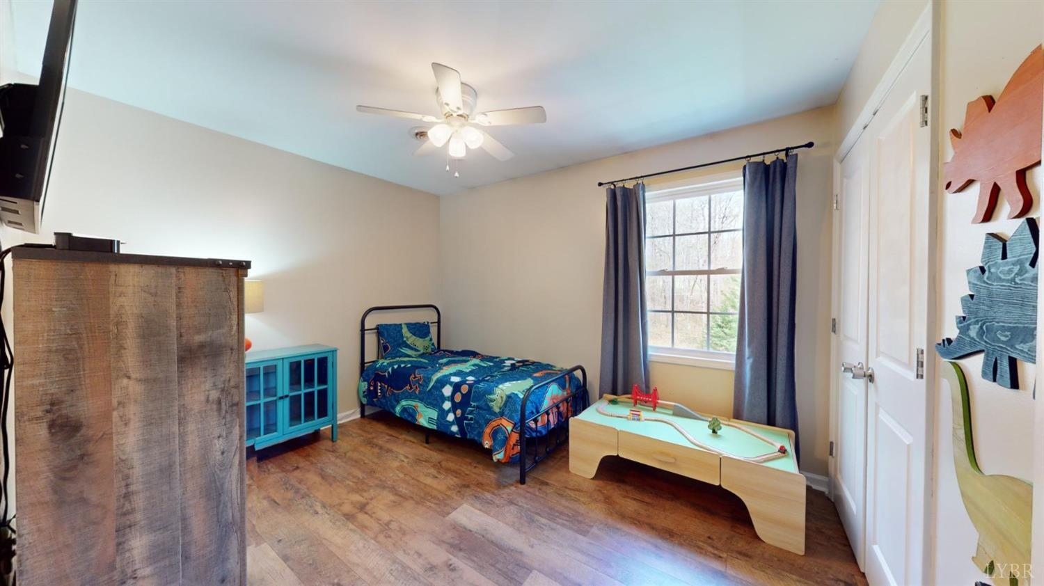 120 Ripley Drive Danville, VA 24540 - Photo 48 of 71 a bedroom with furniture and a window