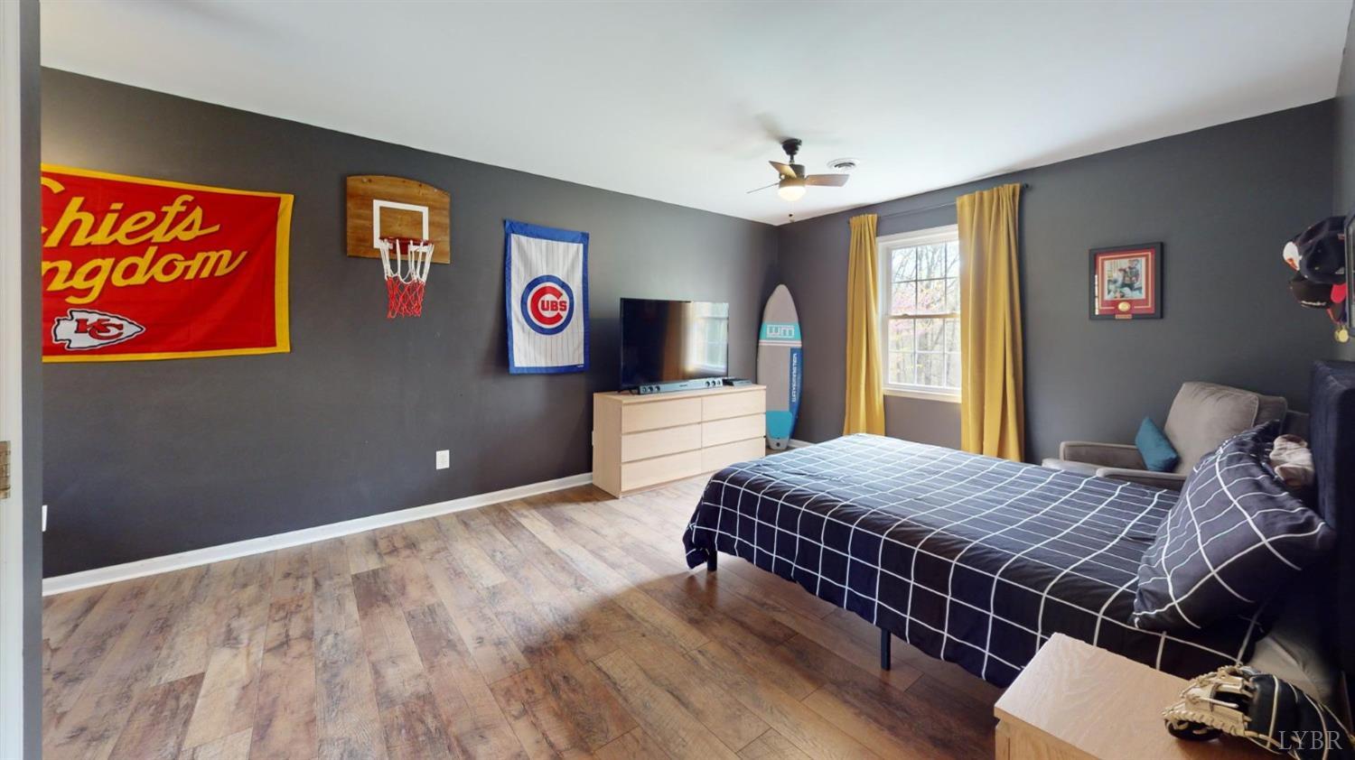 120 Ripley Drive Danville, VA 24540 - Photo 57 of 71 a bedroom with bed and wooden floor