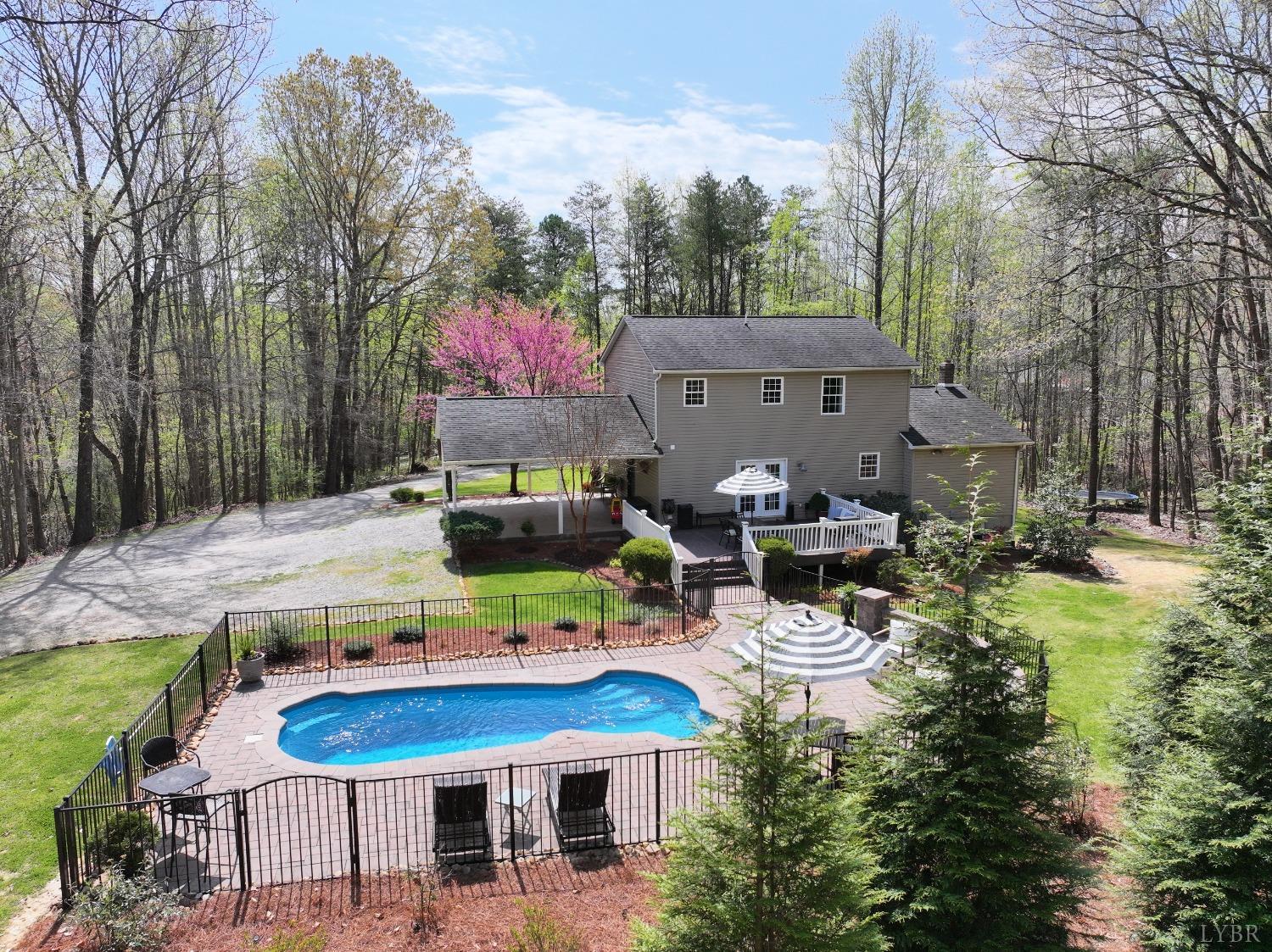 120 Ripley Drive Danville, VA 24540 - Photo 7 of 71 a view of a table and chairs in patio