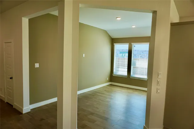 a view of entryway with wooden floor