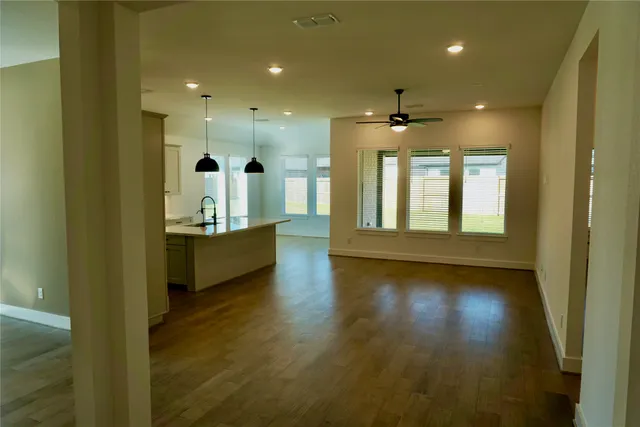 a view of large windows and a chandelier