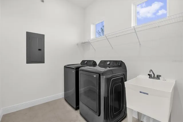 a utility room with dryer and washer