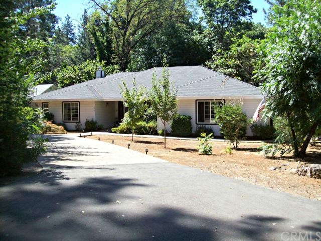 1890 Dean Road Paradise, CA 95969 - Photo 1 of 1 Beautiful custom home for the discerning owner. Front yard features circular driveway and tasteful landscaping.