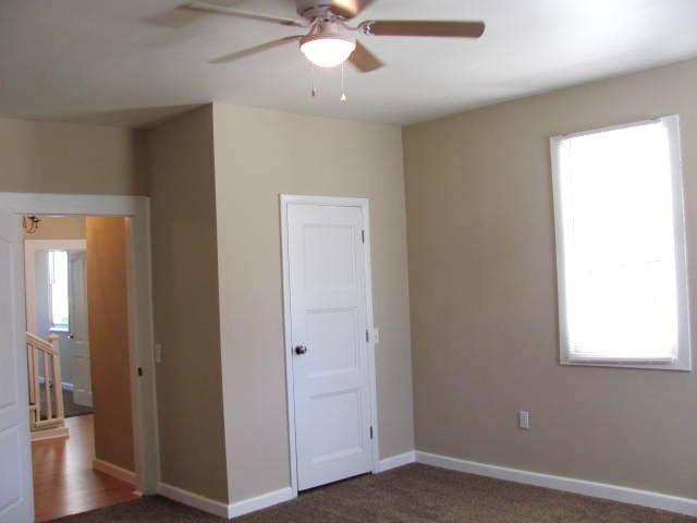 50 Sycamore Landing Road Waverly, TN 37185 - Photo 16 of 20 The two bedrooms downstairs are spacious and have good size closets. This bedroom is on the front west corner of the house.