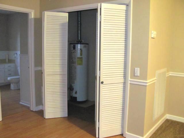 50 Sycamore Landing Road Waverly, TN 37185 - Photo 19 of 20 Don't underestimate the amount of great storage this historic home offers. You will find great storage closets such as this one with double doors just inside near the carport entrance.