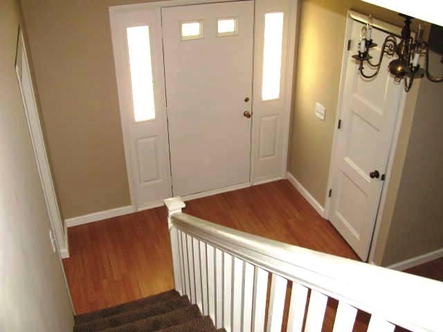50 Sycamore Landing Road Waverly, TN 37185 - Photo 20 of 20 The entry foyer has a handy coat closet, etched sidelights, a lovely brass chandelier, and is the initial welcome area to your lovely old, new home!