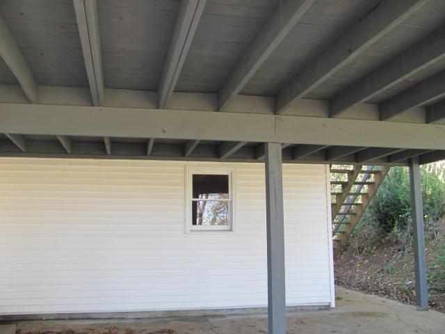 50 Sycamore Landing Road Waverly, TN 37185 - Photo 8 of 20 You will appreciate the wide concrete turn-around space and two car attached carport which will keep you nice and dry in nasty weather while you carry in the groceries. For your convenience, there is a motion detector light at the carport entrance.