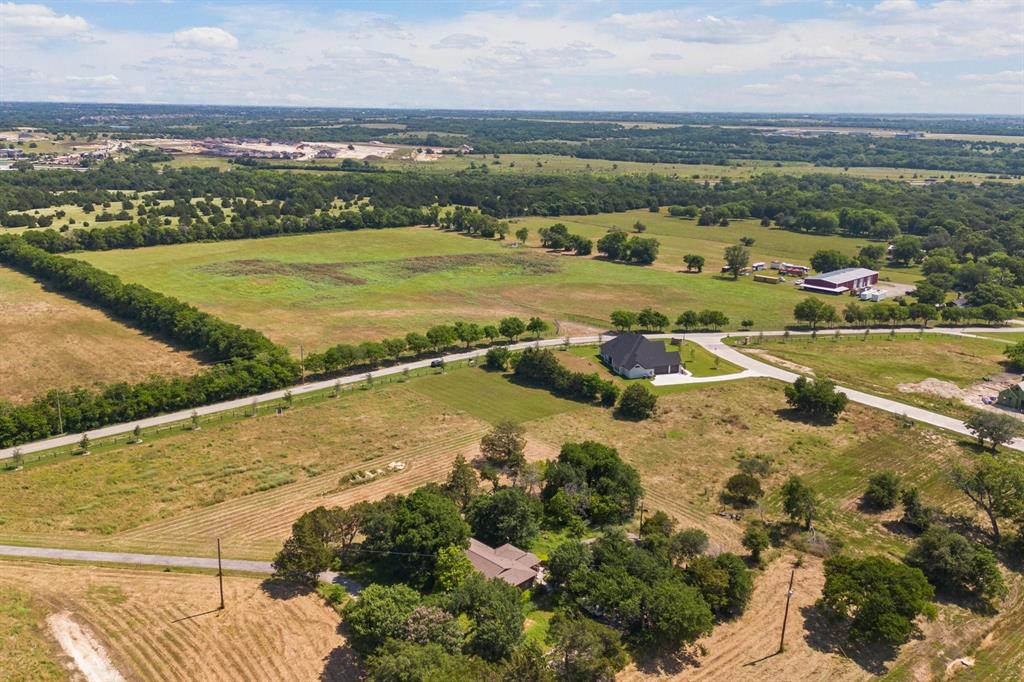 4611 Stout Road Midlothian, TX 76065 - Photo 2 of 11 a view of an ocean and city