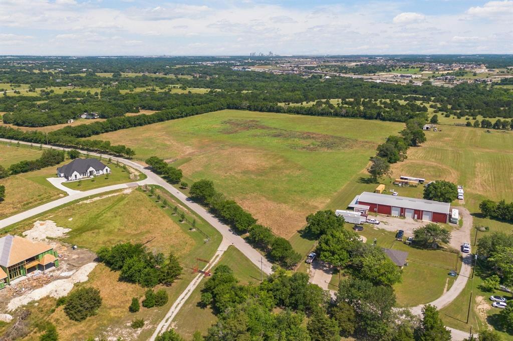 4611 Stout Road Midlothian, TX 76065 - Photo 4 of 11 an aerial view of residential houses with outdoor space and ocean view
