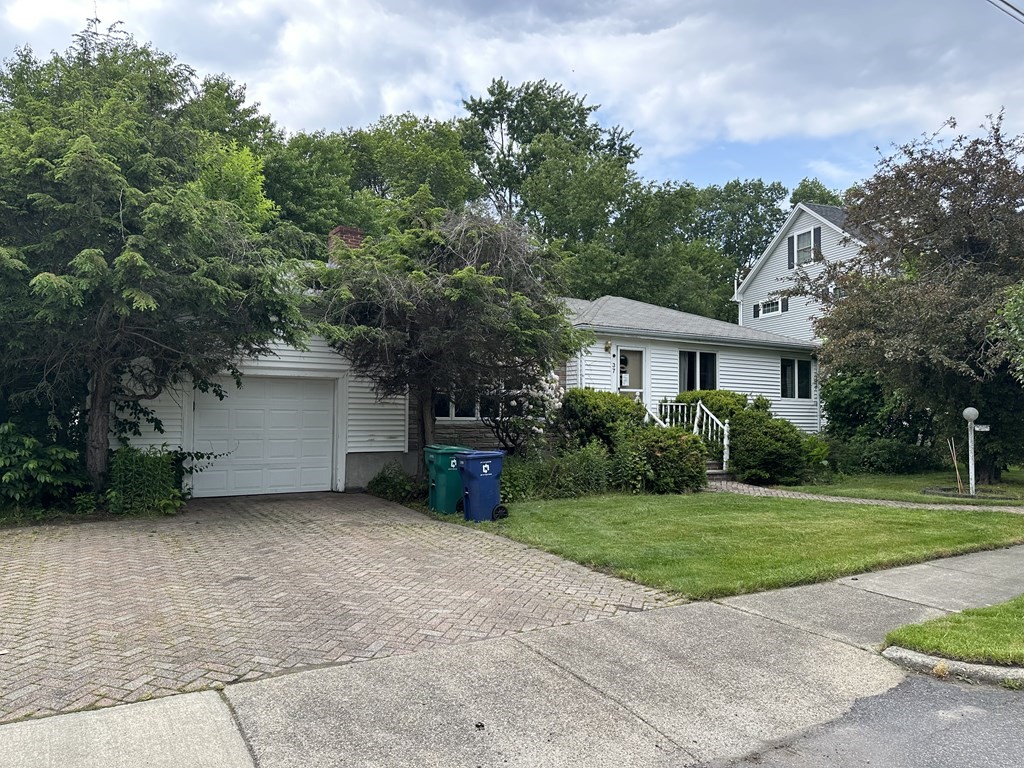 37 Selwyn Road Newton, MA 02461 - Photo 3 of 9 a house view with a garden space