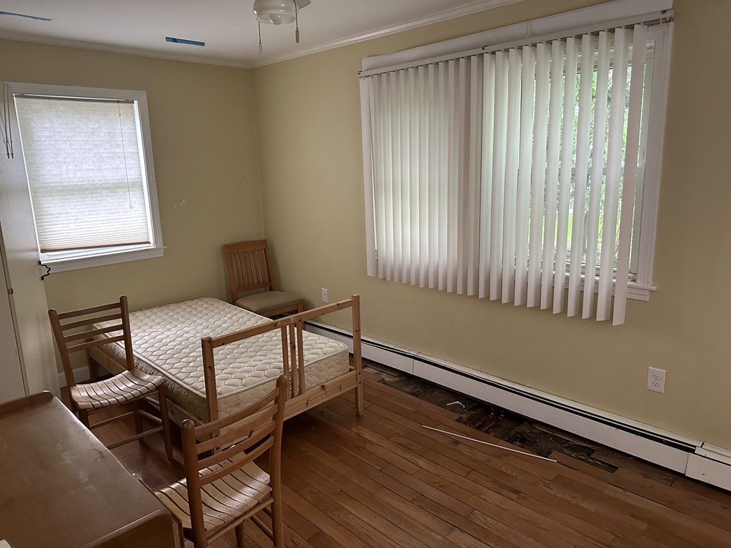 37 Selwyn Road Newton, MA 02461 - Photo 6 of 9 a living room with a bed furniture and a window